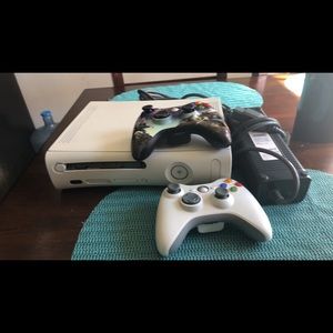 360 Xbox console and 2 wireless remots